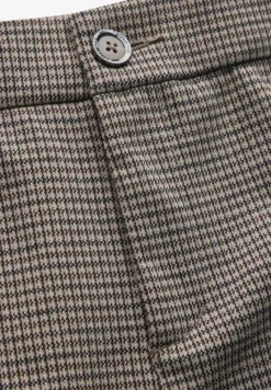 Geruite broek met wijde pijpen
