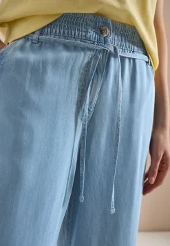 High Waist broek met wijde pijpen in een gewassen look