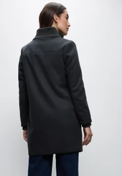 Jas met gebreide details