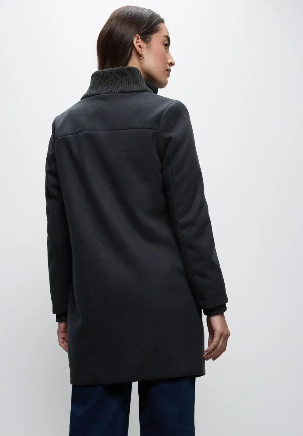 Jas met gebreide details