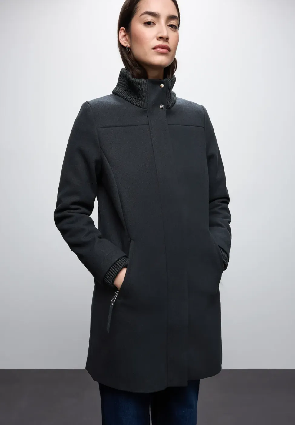 Jas met gebreide details