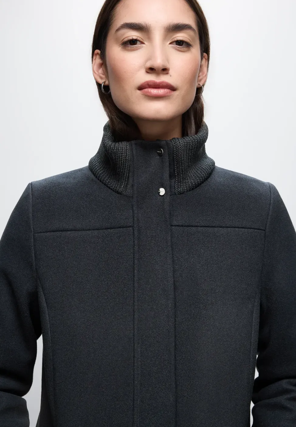 Jas met gebreide details