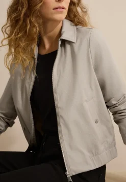 Jas met glitterdetails