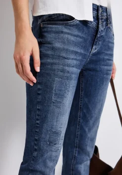 Jeans met destroyed details