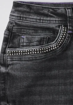 Jeans met details