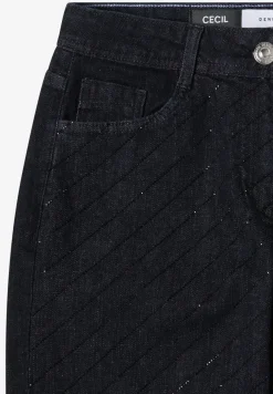 Jeans met edelstenen