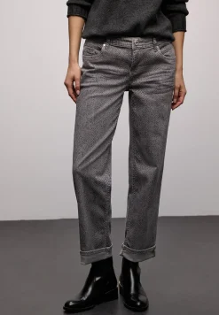 Jeans met slangenprint