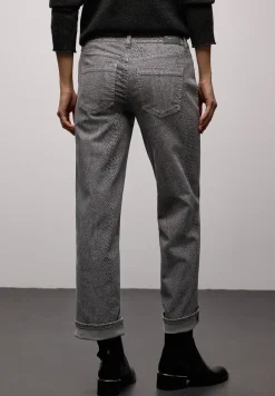 Jeans met slangenprint