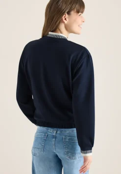 Jersey blouson met contrasterende knoopdetails