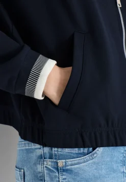 Jersey blouson met contrasterende knoopdetails