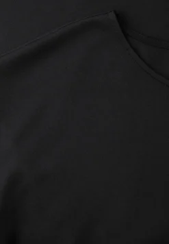 Knielange jersey jurk