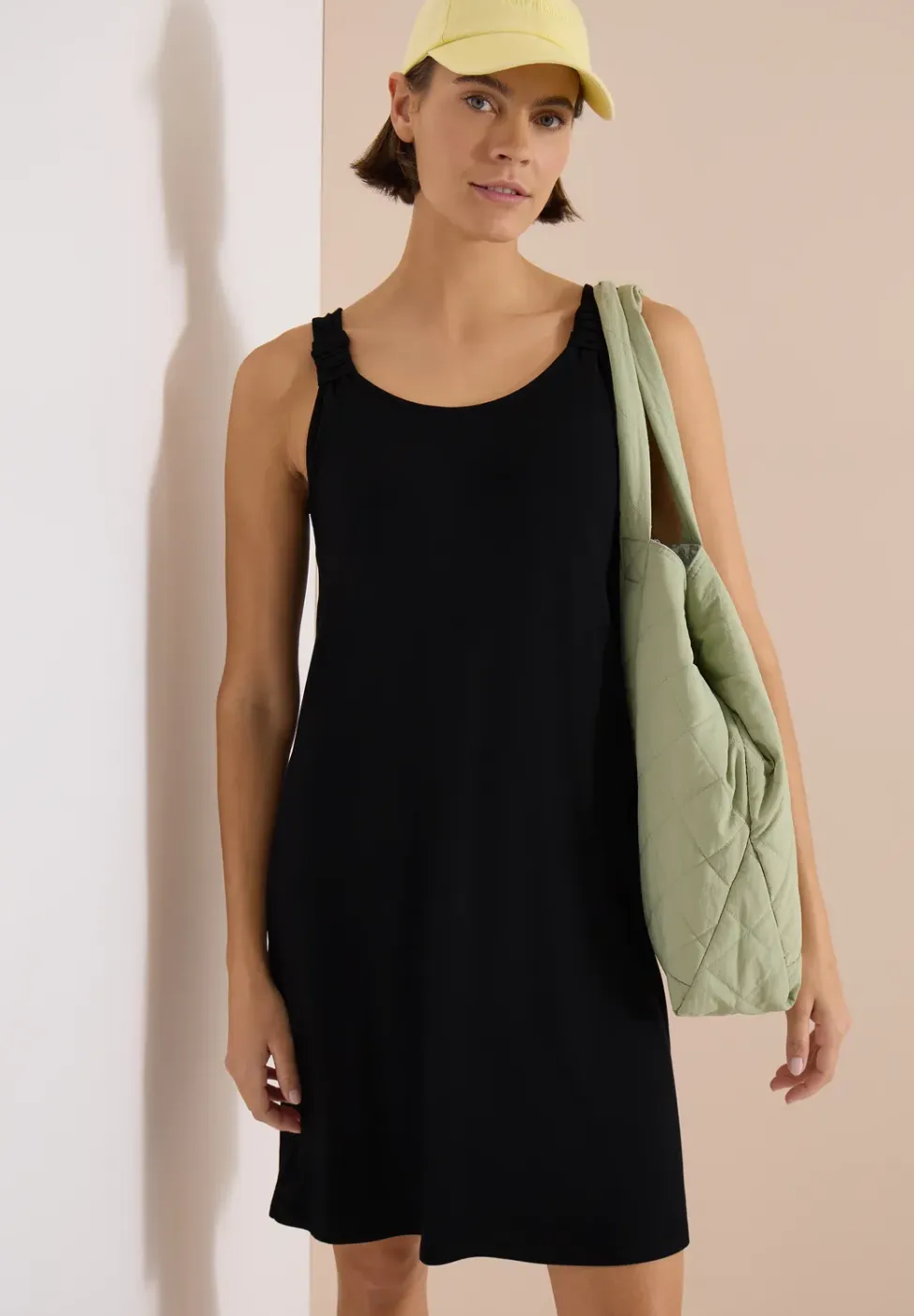 Knielange jurk met knoopdetail