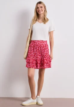Knielange chiffonrok met volants