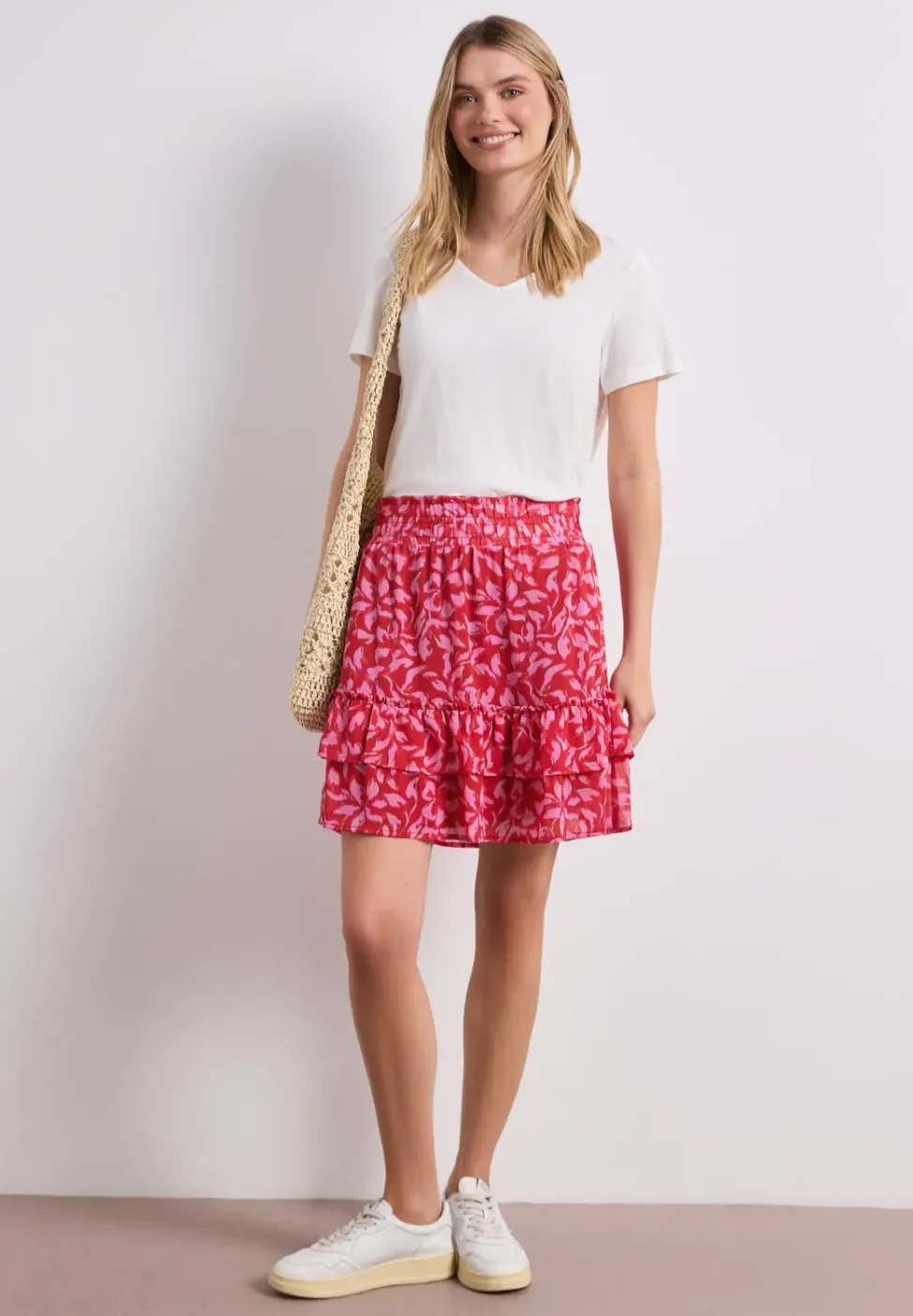 Knielange chiffonrok met volants