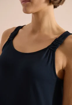 Knielange jurk met knoopdetail