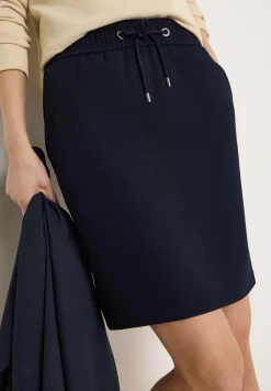 Knielange rok met glitterdetails