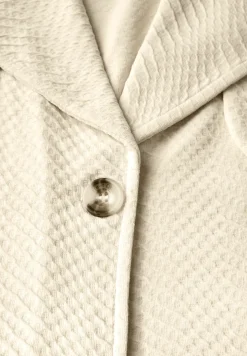 Korte gestructureerde trenchcoat