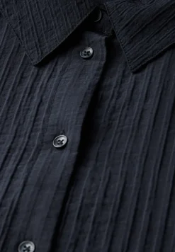 Korte gestructureerde blouse