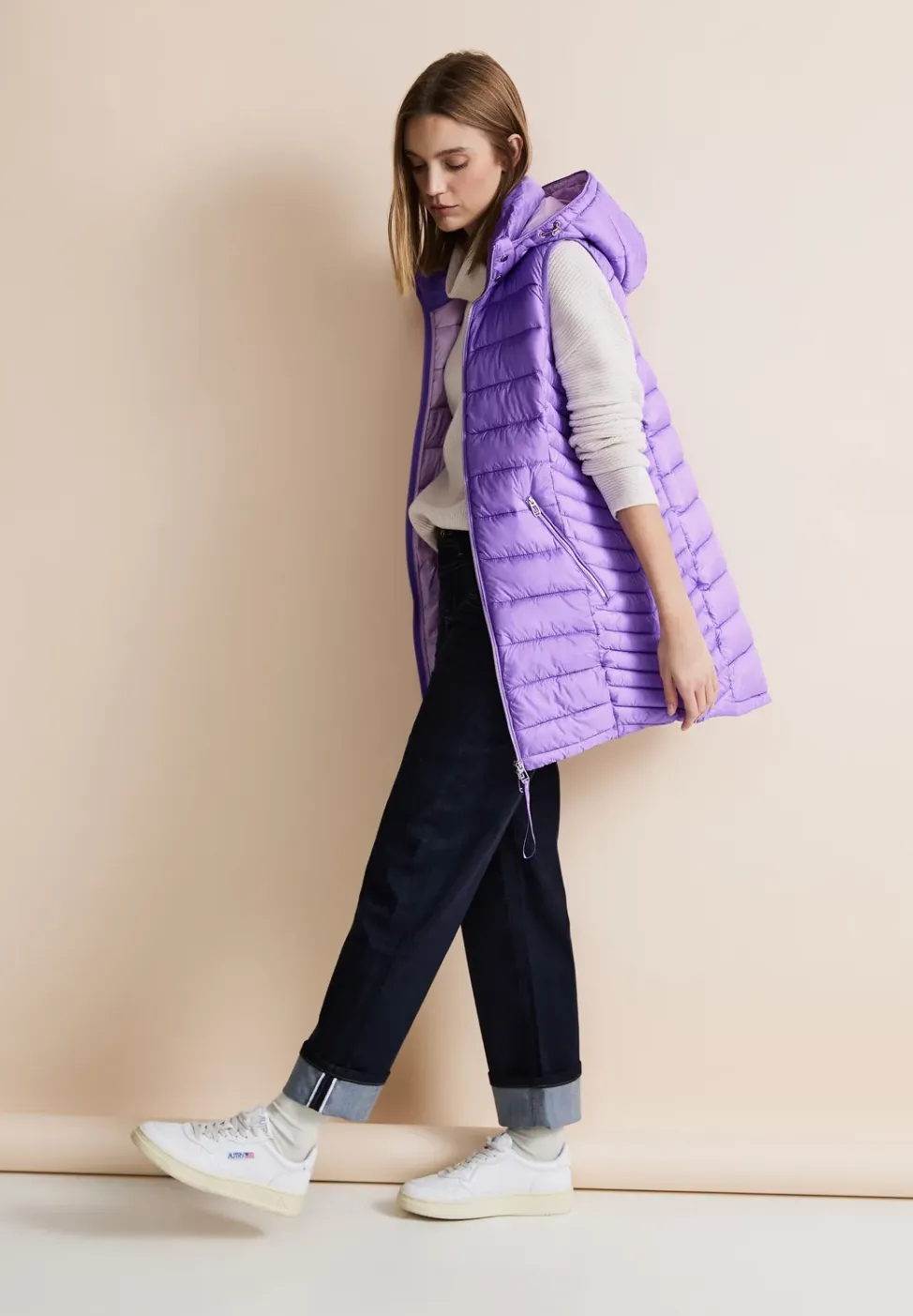 Lange bodywarmer met capuchon