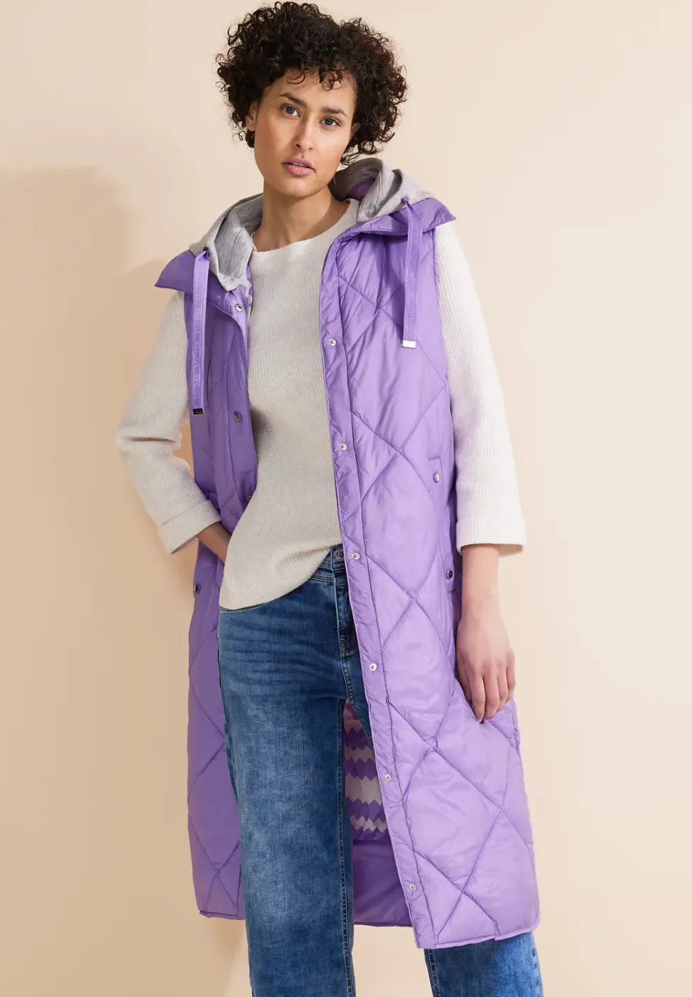 Lange gewatteerde bodywarmer