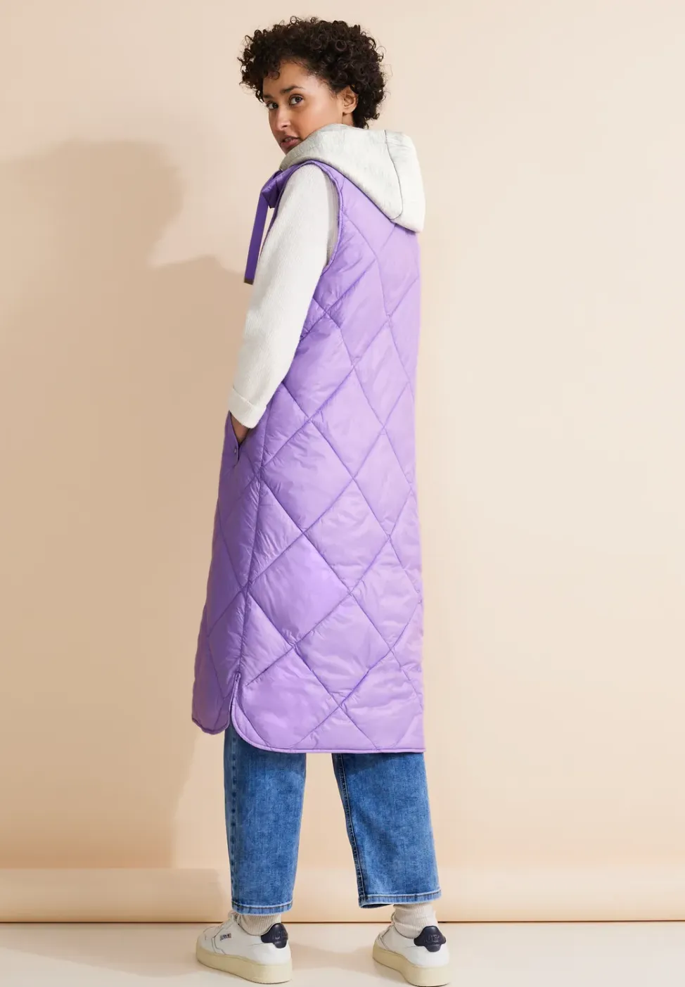Lange gewatteerde bodywarmer