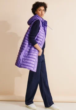 Lange gewatteerde bodywarmer met capuchon