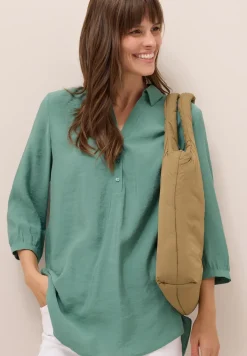 Lange blouse in effen kleur