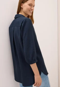 Lange blouse in effen kleur