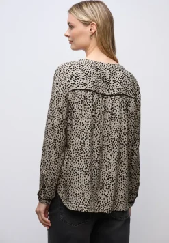 Leo blouse met taping details