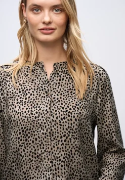 Leo blouse met taping details