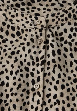 Leo blouse met taping details