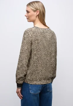 Leo blouse met taping details