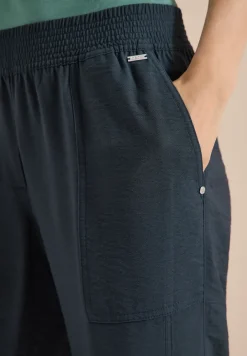 Mid Waist Slim Legs broek in Loose Fit
