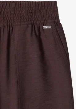 Mid Waist Slim Legs broek in Loose Fit
