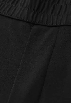 Mid Waist Slim Legs broek in Loose Fit