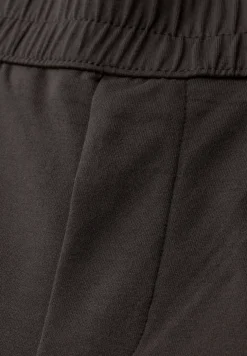 Mid Waist Slim Legs broek in Loose Fit