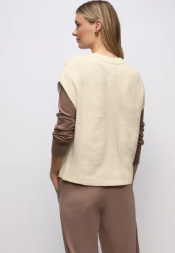 Mouwloze chenille trui