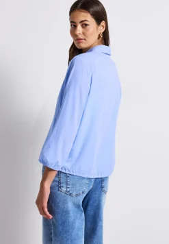 Overhemdblouse met glitterdetails