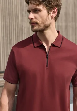 Polo met korte mouwen en ritssluiting