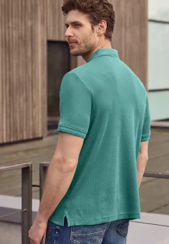 Poloshirt met rits en structuur