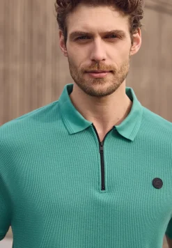 Poloshirt met rits en structuur