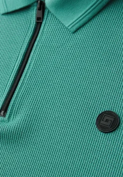 Poloshirt met rits en structuur