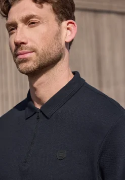 Poloshirt met rits en structuur