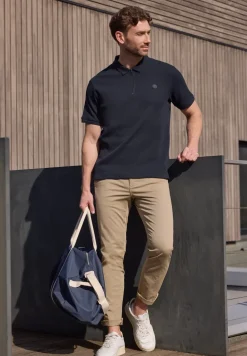 Poloshirt met rits en structuur