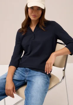 Poloshirt met knoopdetail