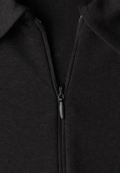 Poloshirt met rits