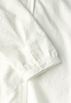 Seersucker blouse met gespleten hals