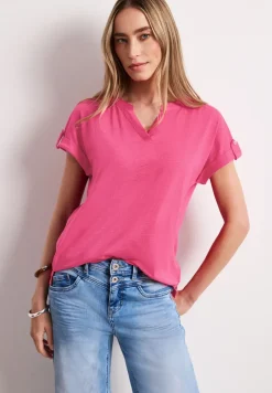 Shirt met gespleten hals en knoopdetails
