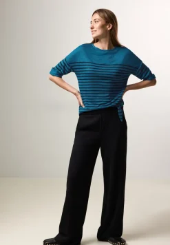 Shirt met knoop in de zoom
