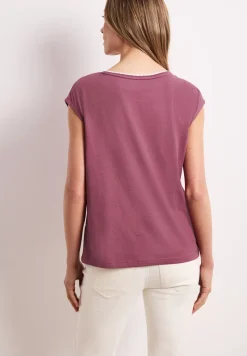 Shirt met overhangende schouder en decoratieve tape